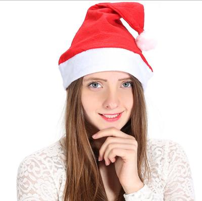 China Christmas decoration wholesale Yiwu non-woven fabric children and adults Christmas hat decorating party Christmas hats for sale