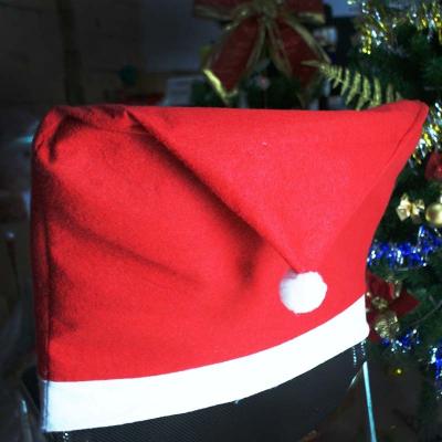 China Simple Hot Sale 60*50cm Nonwoven Fabric Red Folding Christmas Dining Chair Cover for sale