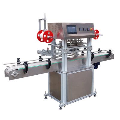 China Line Type Plastic Beverage Bottles Automatic Cloth Bottles Foil Sealing Machine Top Sealing Machine for sale