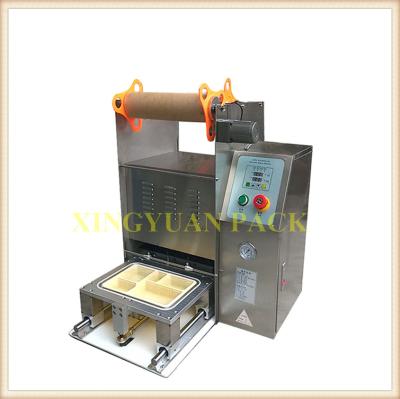 China Full automatic beverage fast food plastic container top sealer machine/sensor sealing machine for sale