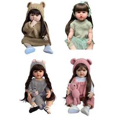 China DNG toddler silicona baby dolls reborn girl 48cm full silicone lifelike newborn munecas bebe bebe for sale with black hair for sale