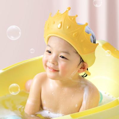 China SANITAIRE Kids Adjustable Waterproof Shampoo Bathing Adjustable Kids Shower Cap Crown Baby Shower Caps Silicone Lovely PP for sale