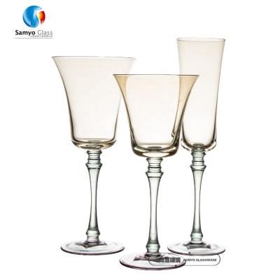 China Solid Amber Color Etched Decoration Gold Rim Spiral Line Decorate Samyo Luster Crystal Wine Glass Cup And Colorful Handmade Champagne Glass Wine Glass Set for sale