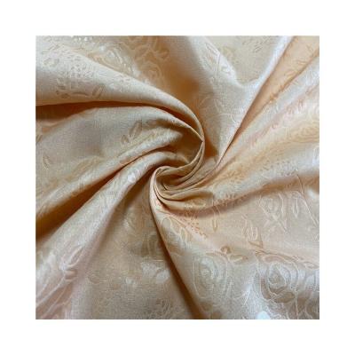 China Huzhou antistatic changxing good quality polyester with embossed fabric for garment for sale