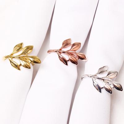 China Modern Napkin Ring Holder Metal Alloy Gold Foil Table Napkins Ring for Wedding Decoration Banquet Party Christmas Dinner Napkin Buckle for sale