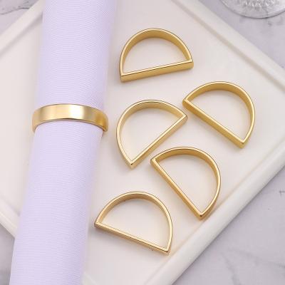 China Gold Metal Alloy Napkin Ring Holder Wedding Party Dinner Christmas Modern Semi Circle Gold Buckle Napkin Rings Napkin Buckle for sale