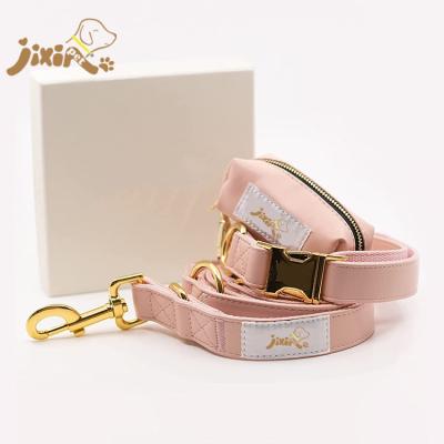 China Personalized Pink Leather Dog Collar Leash Poop Bag Dispenser Set for sale