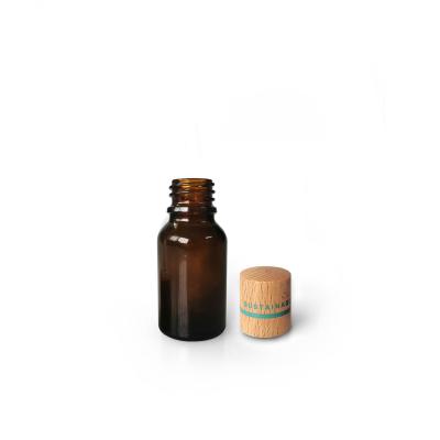 China 15ml Essential Oil Amber Glass Eco-friendly Bottle With Bamboo Cap Of Eco Friendly Skin Care Cosmetic Packaging for sale