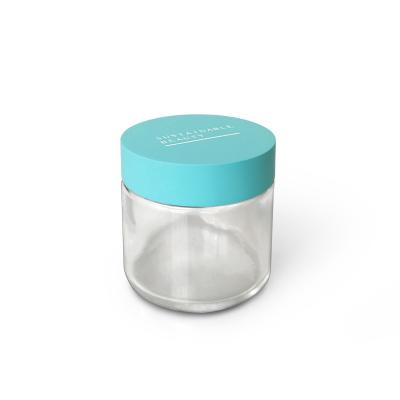 China colorful & 100g Glass Cream Jar Eco - Friendly Sustainability Cosmetic Packaging With Blue Bamboo Lid for sale