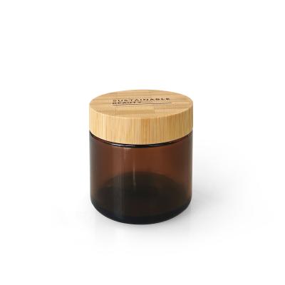 China natural & Eco-friendly 100g face cream amber glass jar with bamboo lid from sustainablecosmetic packaging for sale