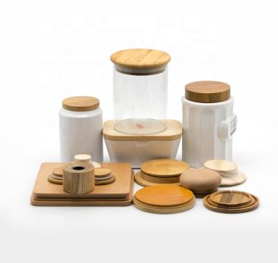 China Pilfer-proof Mass Production Customized Logo Eco-Friendly Bamboo Wooden Lid For Storage Stacked Glass Jar for sale