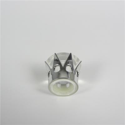 China Pilfer-proof Silver And Clear Crown Plastic Cap For Perfume Bottles for sale