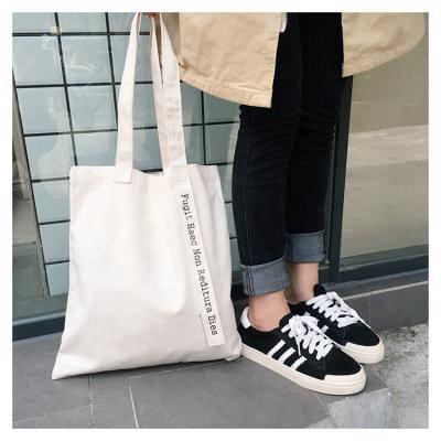 China Eco Friendly Fashion Tote Cotton Fabric Plain Canvas Bag With Logo for sale