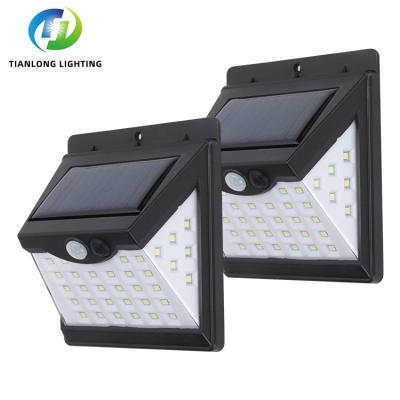 China Hot Sale ABS SMD Sensor IP65 40W Solar Power Induction Outdoor Waterproof Garden LED Outdoor Solar Wall Lamp for sale