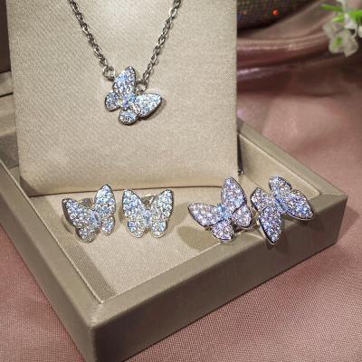 China Zircon 17KM Exquisite FASHIONABLE Crystal Butterfly Pendant Necklace and Earrings Set Women Fashion Butterfly Jewelry Set for sale