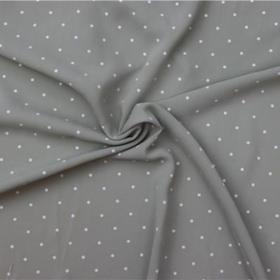 China Dots Fabric White Glue Fashion Pattern Simple Design Anti Pill Durable Fabric for sale