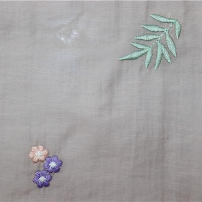 China Anti Pill New Arrival Green Leaves Shape Concise Embroidery Textile Fabrics Plain Tencel Fabrics for sale