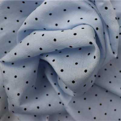 China Anti Pill Fashionable Style Black Dot Pattern Fabric Flocking Fashion Textile Fabrics For Clothing for sale