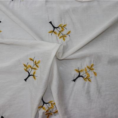 China Anti pill top selling yellow factory embroidery fabric textile raw material exquisite avant-garde fabric for sale