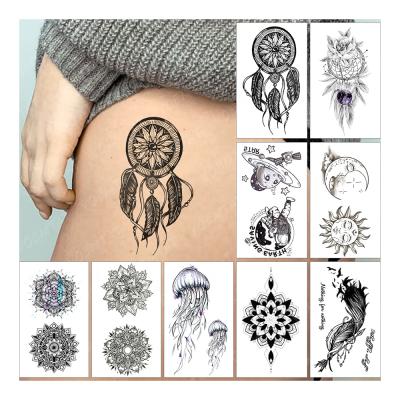 China Instant Body Art Waterproof Temporary Tattoo Sun Moon Flower Fether Temporary Dreamy Kids Astronaut Catcher Tatto Sticker Small for sale