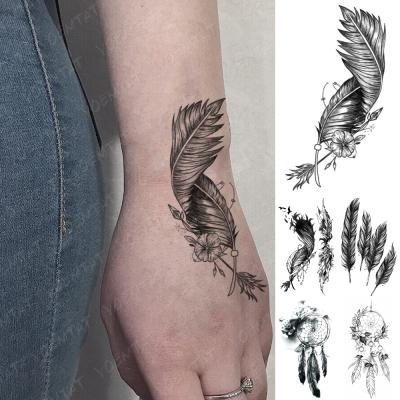 China Wholesale Temporary Beautiful Feather Dreamcatcher Orchid Flower Small Black Tatoo For Temporary Arm Waterproof Mini Tattoo Woman Sticker for sale