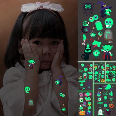 China Glowing Waterproof Temporary Potion Kids Skull Demon Eye Spider Tatto Halloween Horror Temporary Tattoo Sticker Glowing Waterproof for sale