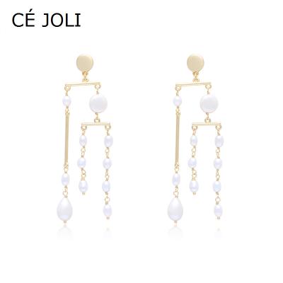 China Unique Design Model Earrings Lead Free Nickel Free Fashion New Design Natural Pearl Long Drop Earrings Ivory White Pearl Party Jewelry Korea for sale