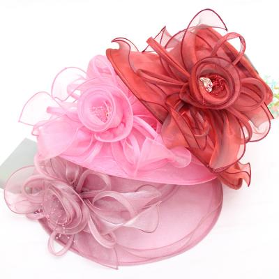 China Elegant Plush Wedding And Church Hats Round Organza Flat Top Bridal Ladies Women Polyester Nigerian Fascinator For Church for sale