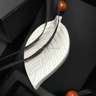 China Sustainable Leaf Shape Car Air Freshener Air Freshener Ceramic Aroma Diffuser Ceramic Stone for sale