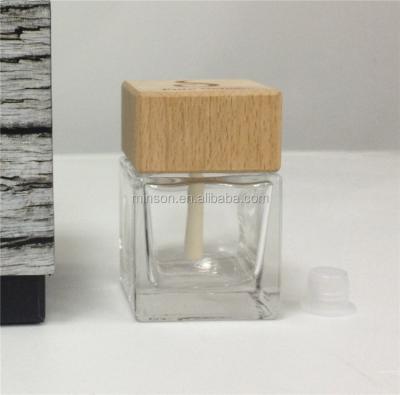 China Viable glass essential oil diffuser bottle, used square glass wooden lid with rattan stick for wholesale for sale