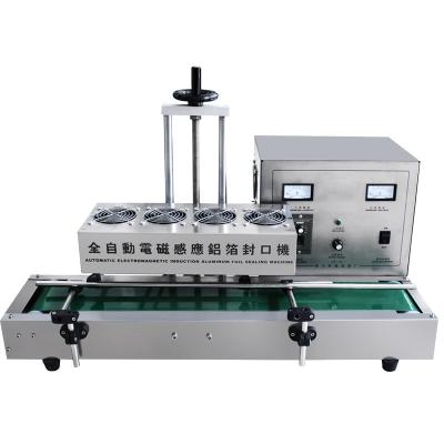 China High Efficiency Automatic Continuous Plastic Bottle Electromagnetic Induction Aluminum Foil Sealing Machine for sale