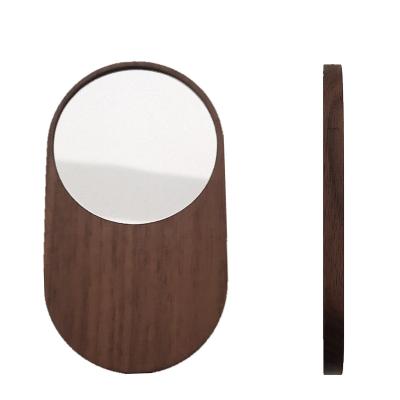 China Hot Selling Wholesale Custom Minimalist TDF Wooden Makeup Cosmetic Oval Pocket Make Up Mini Mirrors Small Mirror Hand Held for sale