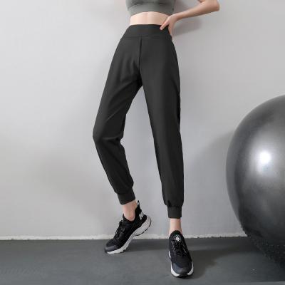 China Breathable Women's High Waist Fitness Yoga Pants Loose Joggers Elastic Waist Quick Dry Lightweight Custom Running Active Pants for sale