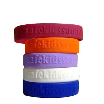 China CLASSIC Logo Silicone Wristband Manufacturer Custom Embossed Rubber Wristband for sale