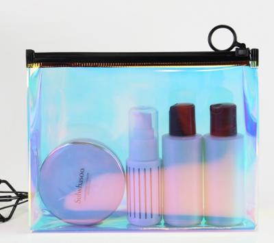 China Custom Made Laser Transparent Waterproof Clear Clear Waterproof Makeup Bag Storage Travel Makeup Holographic PVC TPU Holographic Bag for sale