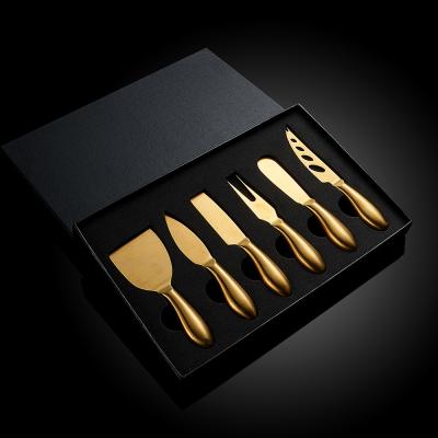 China Durable High End 304 Stainless Steel Cheese Razor Spreader Fork Gold Cheese Knife Set for sale