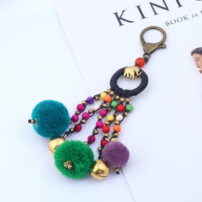 China Folk-custom Bohemian style metal wad cards key chain lobster buckle hair ball bronze bell pendant YCK072 new retro for sale