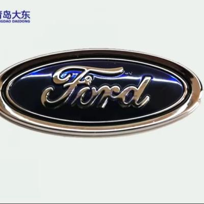 China Logotipo de automóvil de metal personalizado ideal para su estrategia de marca en venta