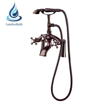 China Sliding Bar Deck Mount Clawfoot Tub Filler Handshower Bathtub Faucet Antique Brass Vintage Without Shower Taps Watermark for sale