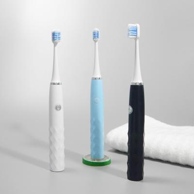 China Sonic Electric Toothbrush Automatic Rotating Battery Powered Toothbrush with 4 Replacement Brush Heads for sale