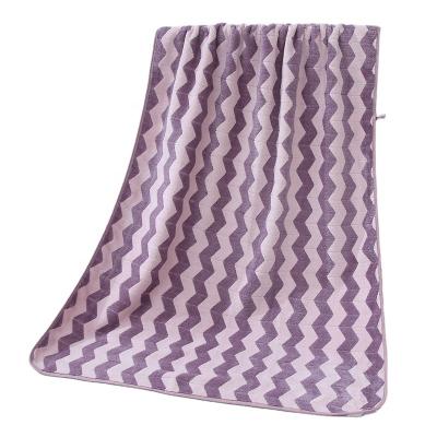 China Compressed Wrap Weave Coral Fleece Bath Towel Thick Wicking Beach Towel Throw Blanket 70x140cm for sale