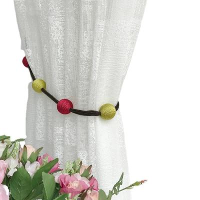 China Candy Simple curtain magnetic fastening straps moderncurtain woven straps ornaments special accessories curtain buckle ball for sale