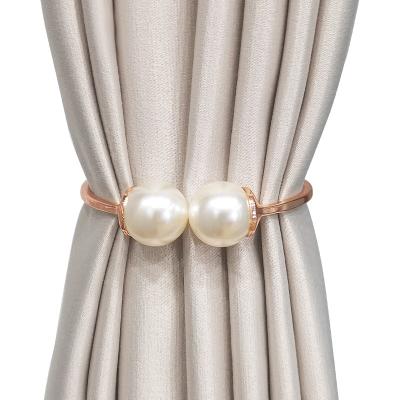 China Modern Pearl curtain tieback spring design curtain clip magnetic tied thin window curtains tie back wedding decorations for sale