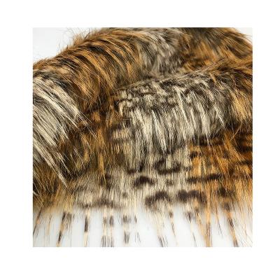 China High-grade Auto Upholstery Jacquard Faux Raccoon Fur For Apparel Fur Collar Faux Plush Fabric In Stock for sale