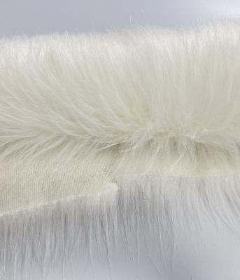 China Auto upholstery white long haired fur fabrics are available in large quantity and the price is cheap for sale