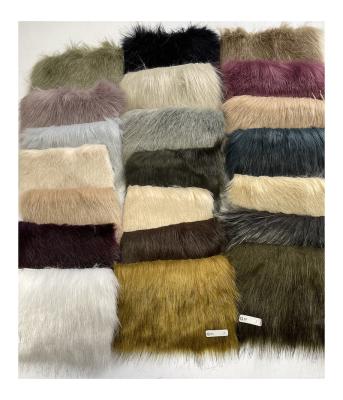 China Fake Plush Auto Stock China Upholstery Artificial Fur Fabrics Used In Clothing Carpet Toys for sale