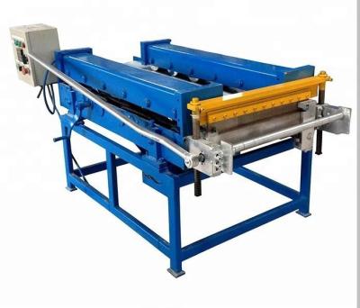 China Portable standing seam roofing machine snap lock roofing machine standing seam roof panel machine for sale