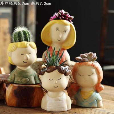 China Amazon Durable Material Hot Selling Head Shape Creative Cartoon Ceramic Potted Doll Ornaments Pottery Plant Flowerpot Succulent Flower Pot for sale