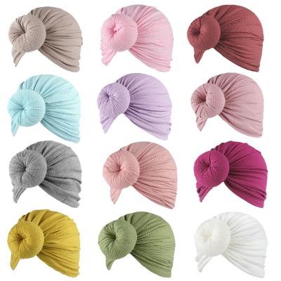 China Picture Cotton Baby Knot Turban Hat with Donut Ball Custom Size and Color for sale