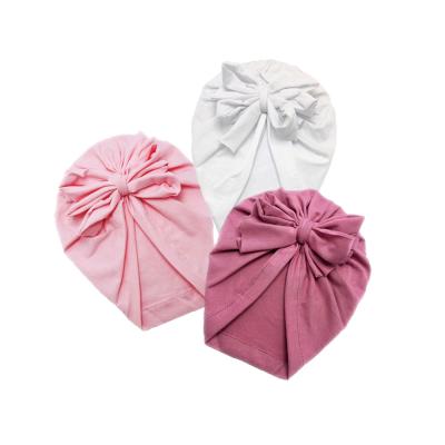 China Classic Picture Big Bow Kids Knot Turban in Pink and White Color for sale